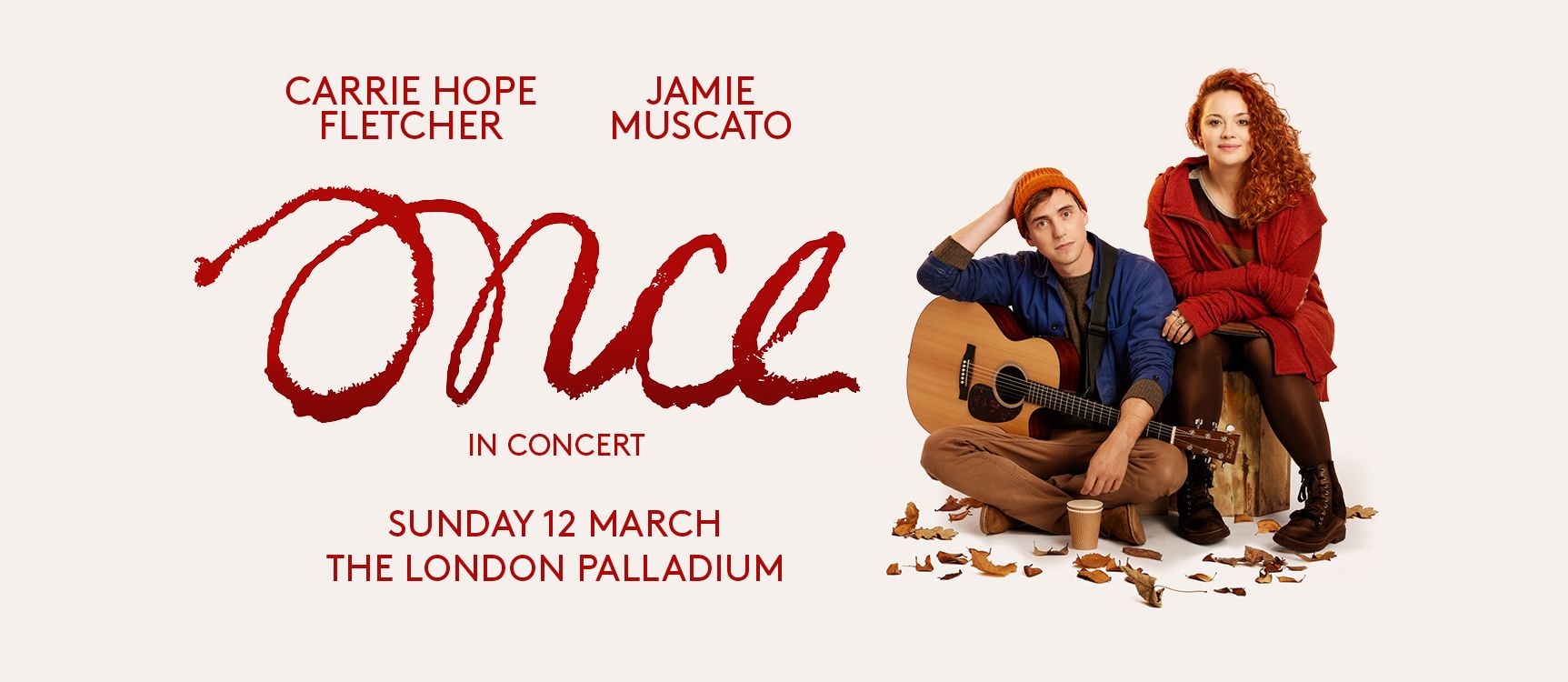 A picture of Carrie Hope Fletcher and Jamie Muscato, posing with a guitar ahead of starring in Once In Concert
